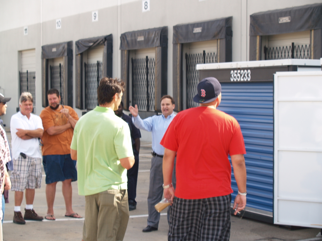 BoldBids Houston Estate Auctions, Estate Sales & Probate Liquidation — Professional Auctioneer Auctioneer calling bids at a live sale, representing BoldBids Houston estate auctions, estate sales, and probate‑related liquidation services