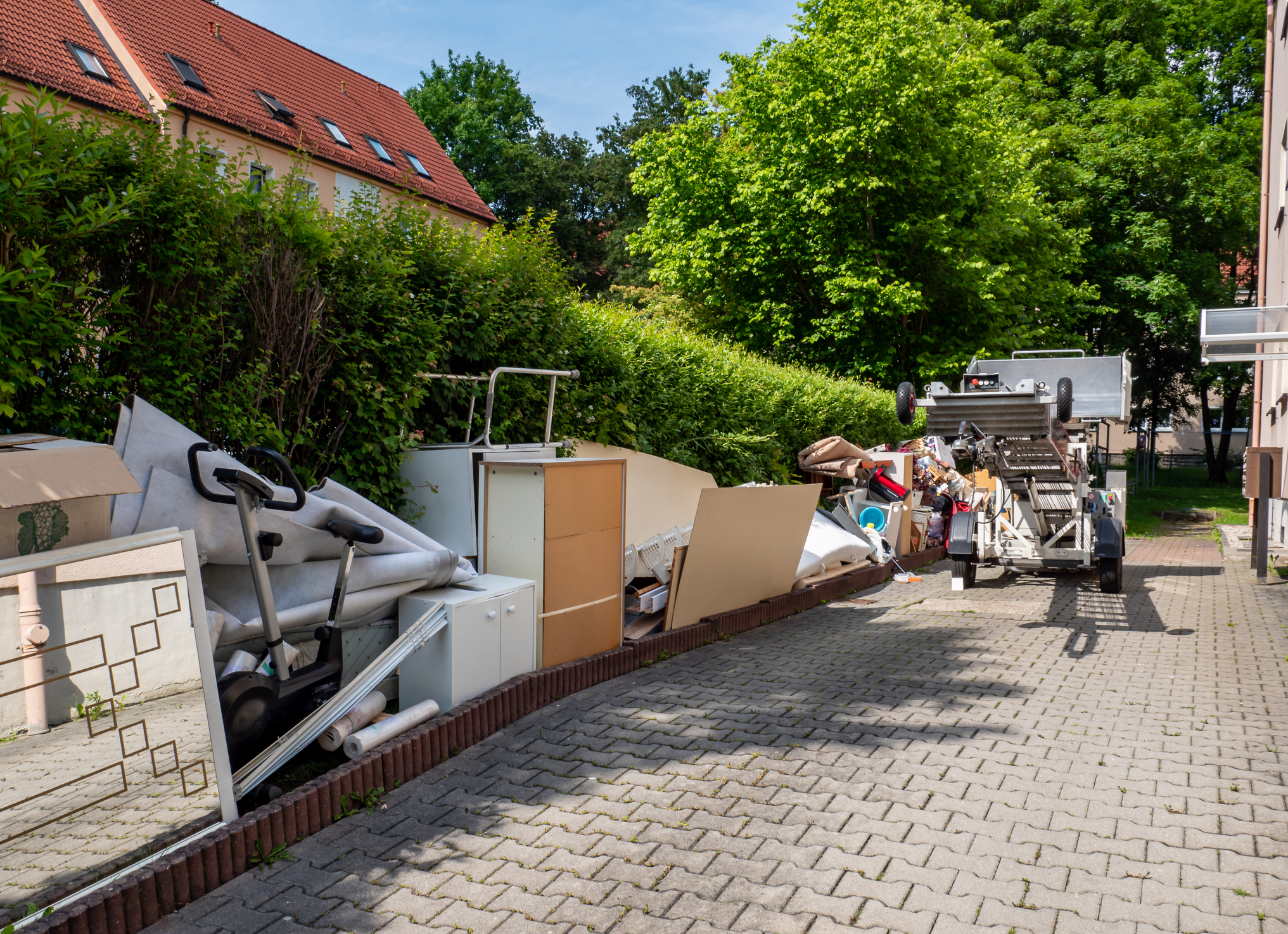 Furniture and bulky waste removal team preparing items for disposal, representing BoldBids Houston estate cleanouts, estate sales, and probate‑related property services